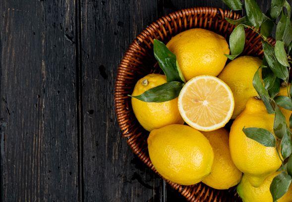 top-view-fresh-ripe-lemons-wicker-basket-black-with-copy-space (1).jpg